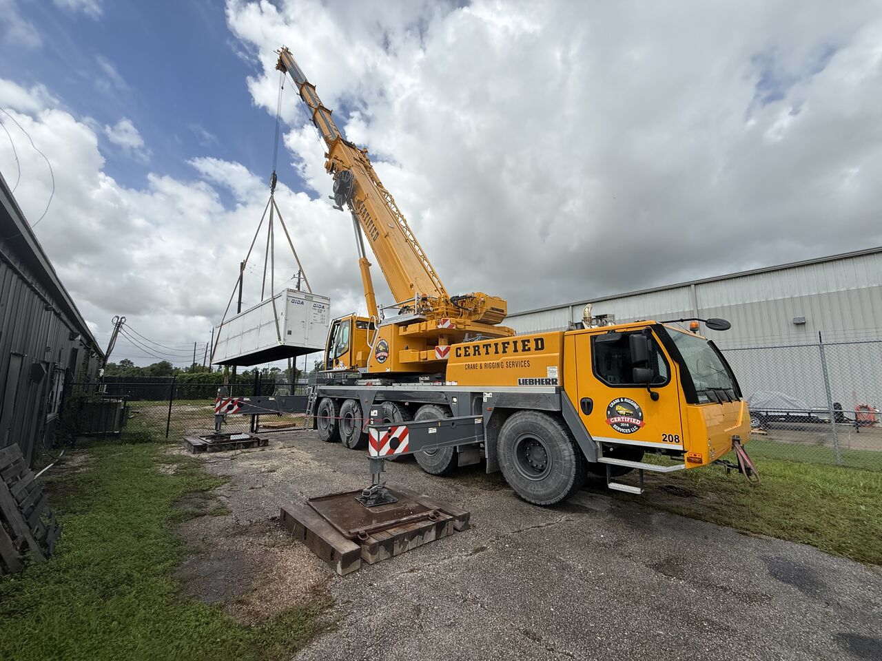 Crane installing compute module at a Celestial Compute site